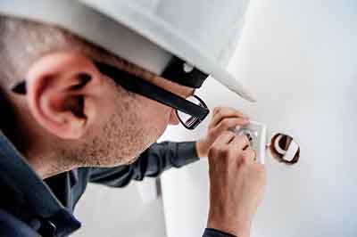 Electrical contractor at work